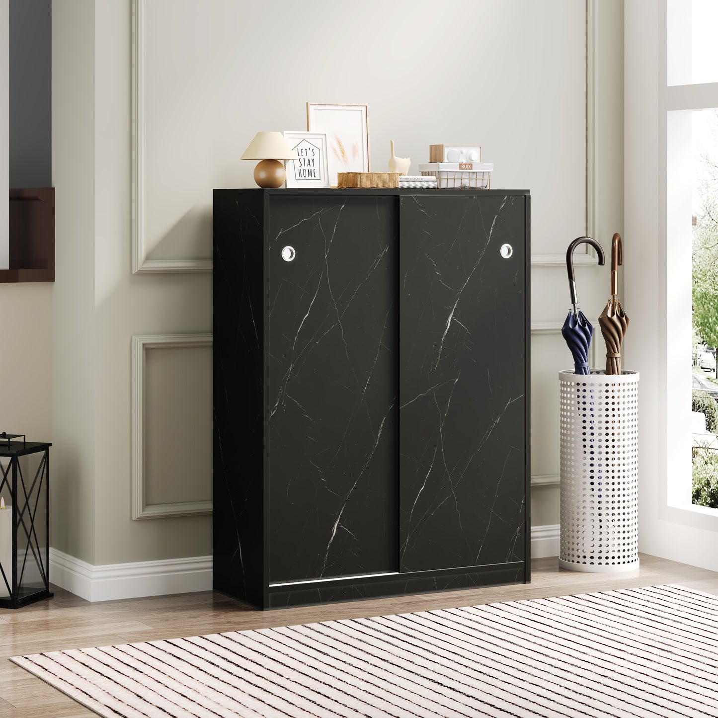 Black marble sliding door cabinet with silver handles perfect for modern entryways