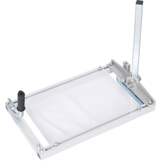 Precision paper cutter with adjustable ruler and ergonomic handle for accurate cutting tasks