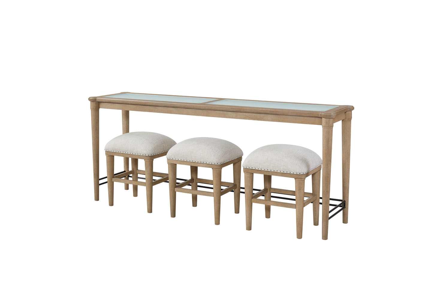 Three upholstered bar stools with nailhead trim under a light wood console table with a glass top