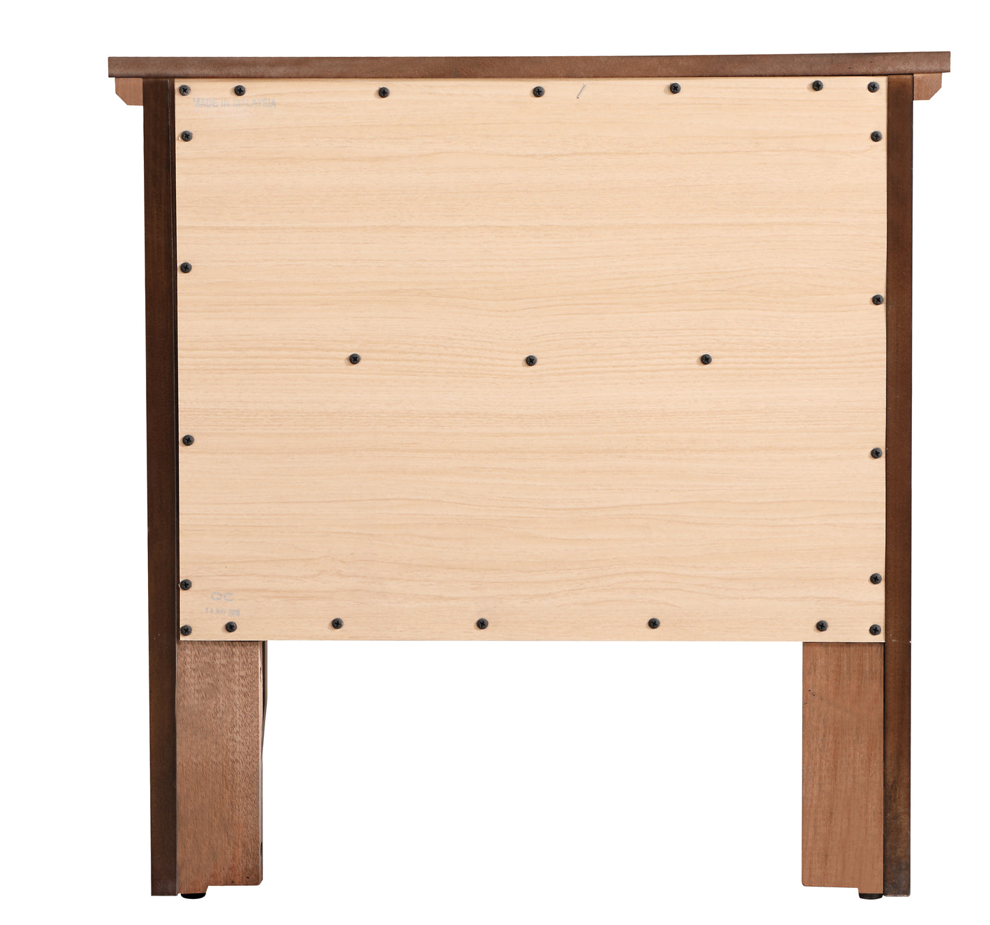 Back view of a light wood particleboard nightstand panel with dark wood frame and screws