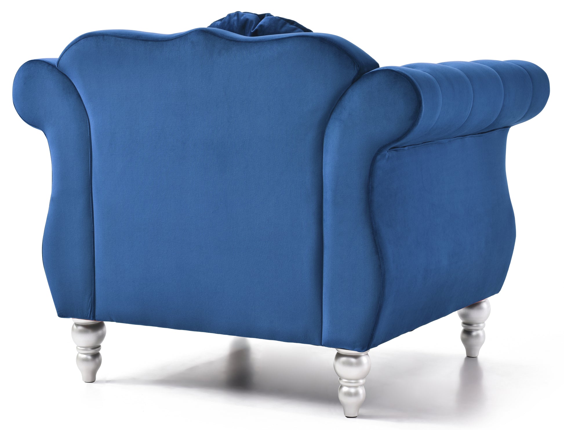Elegant blue velvet armchair with tufted back and ornate silver legs