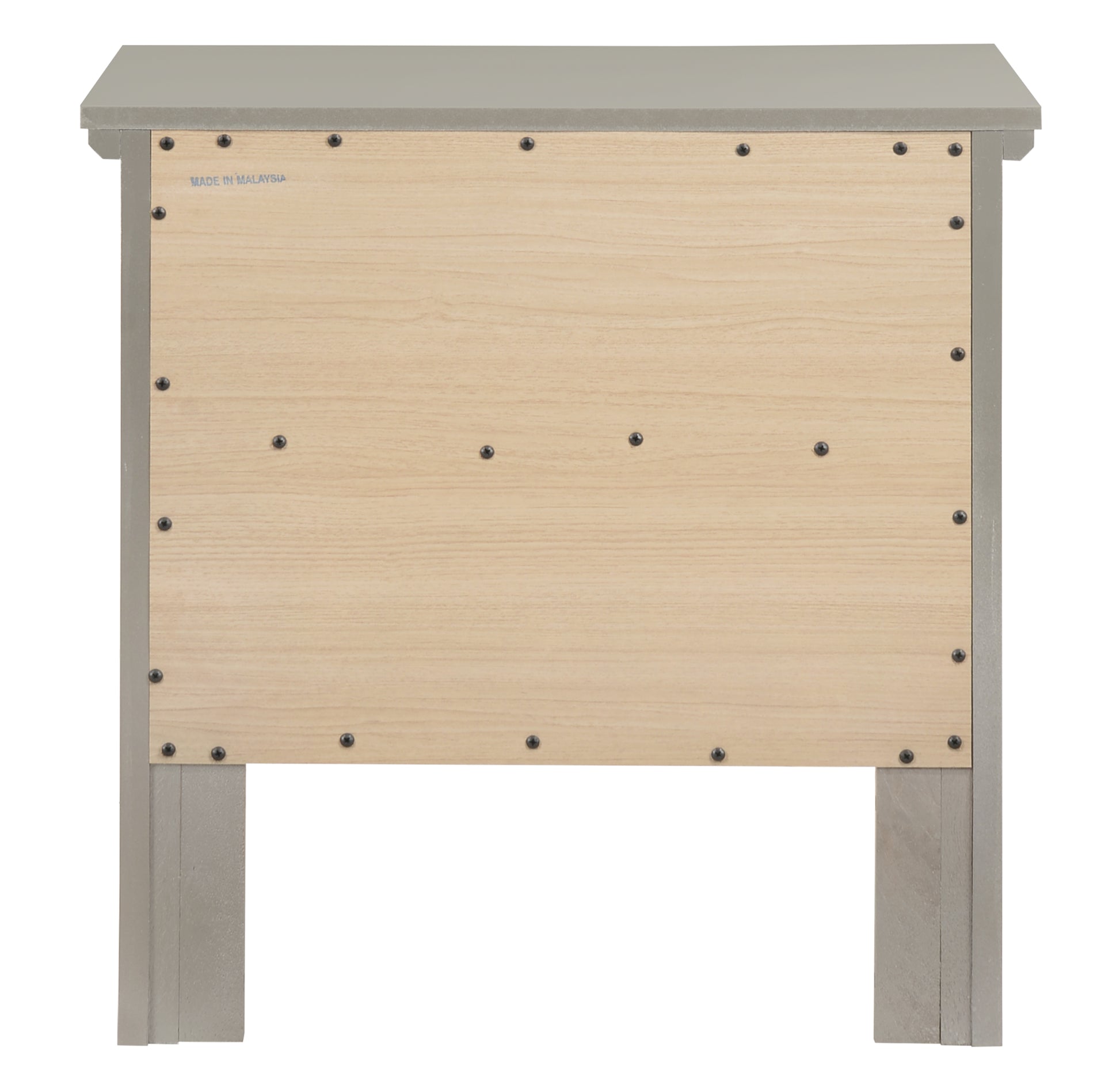 Back of gray composite nightstand with light wood panel and visible screw fasteners
