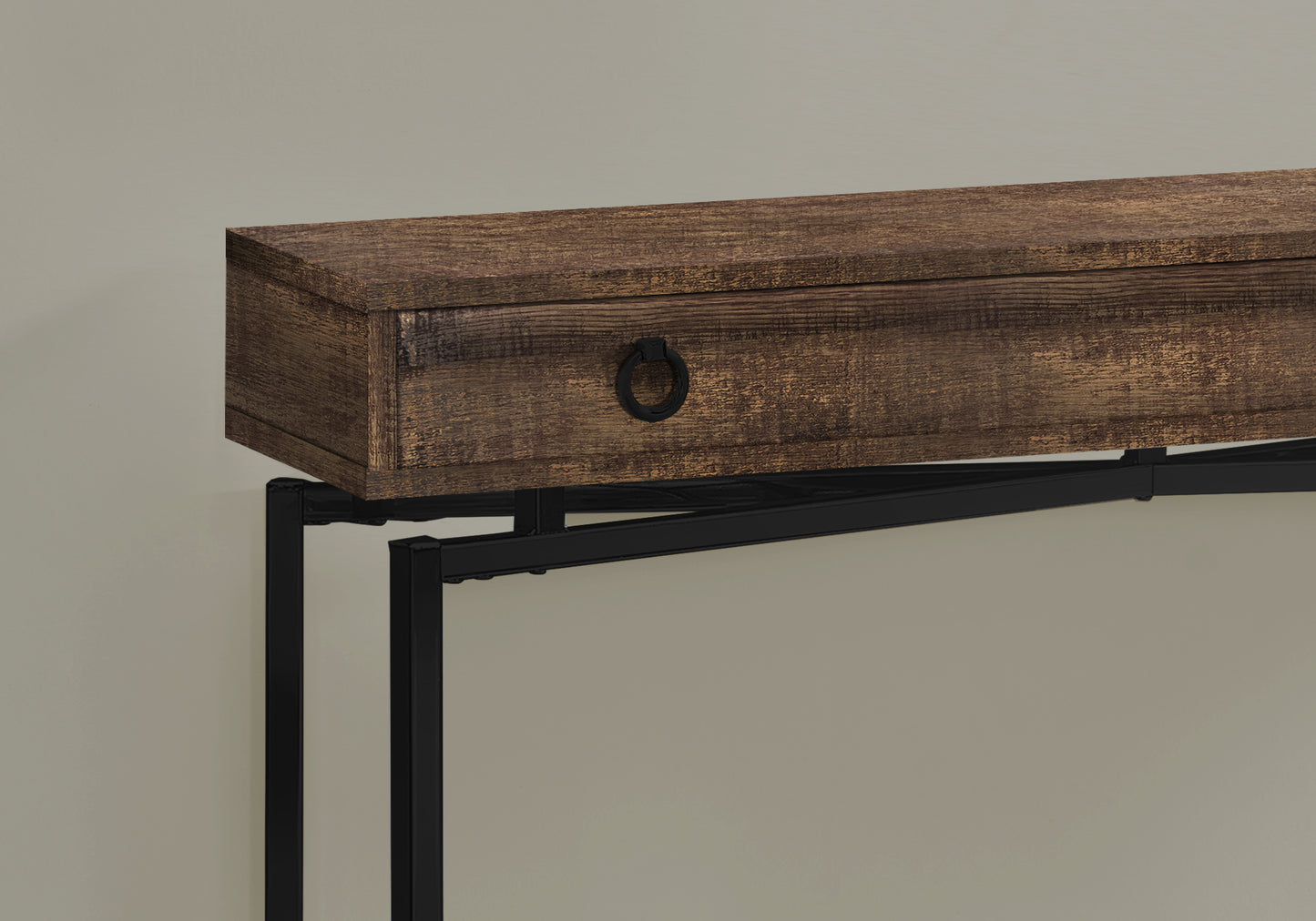 Rustic brown wooden console table with black metal legs and one drawer with a ring pull