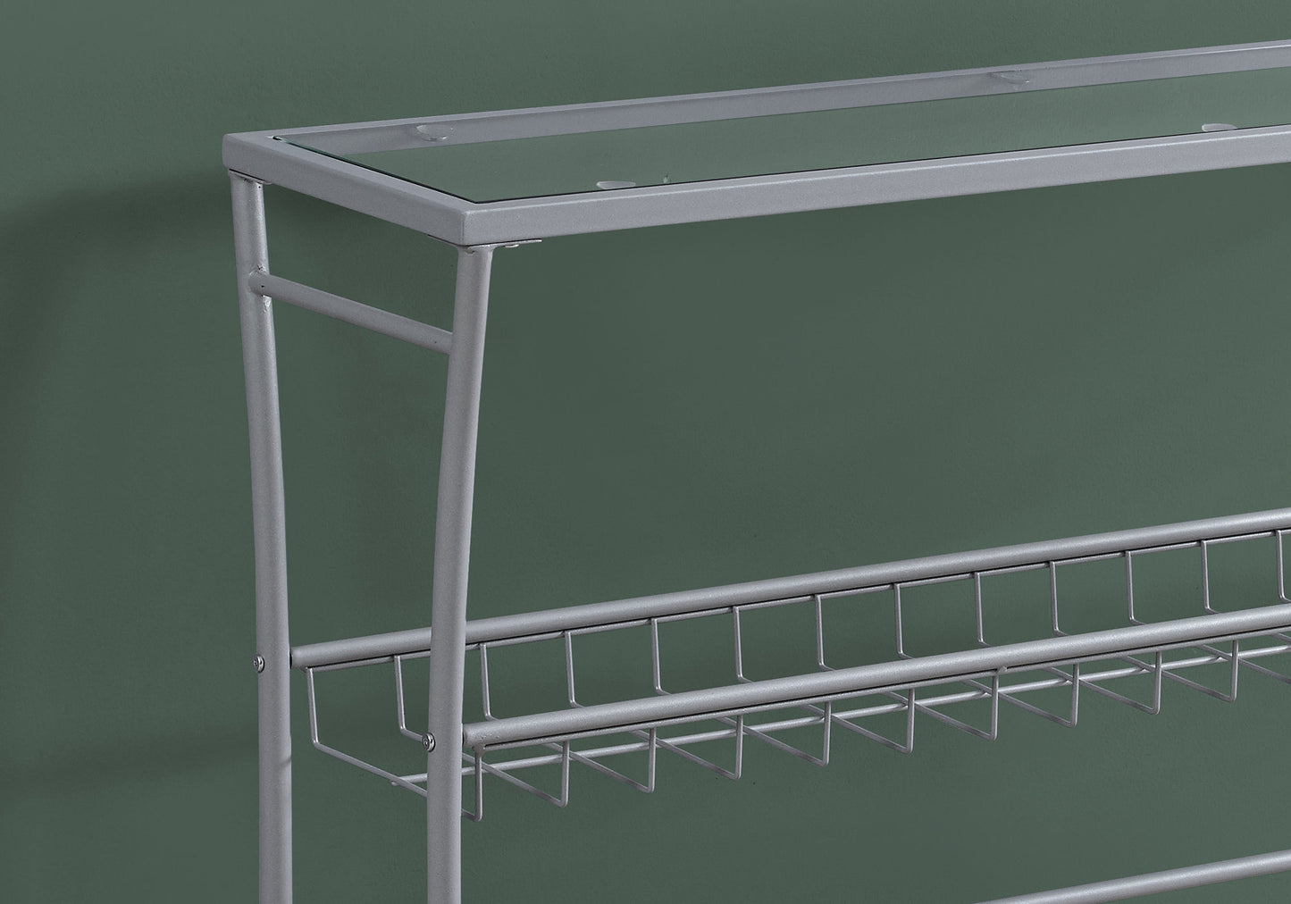 Modern silver metal plant stand with clear glass top shelf and wire basket shelves
