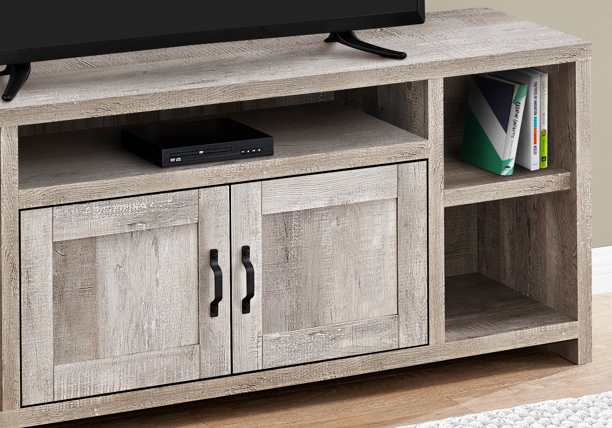 Rustic wood TV stand with double doors and open shelving perfect for media consoles