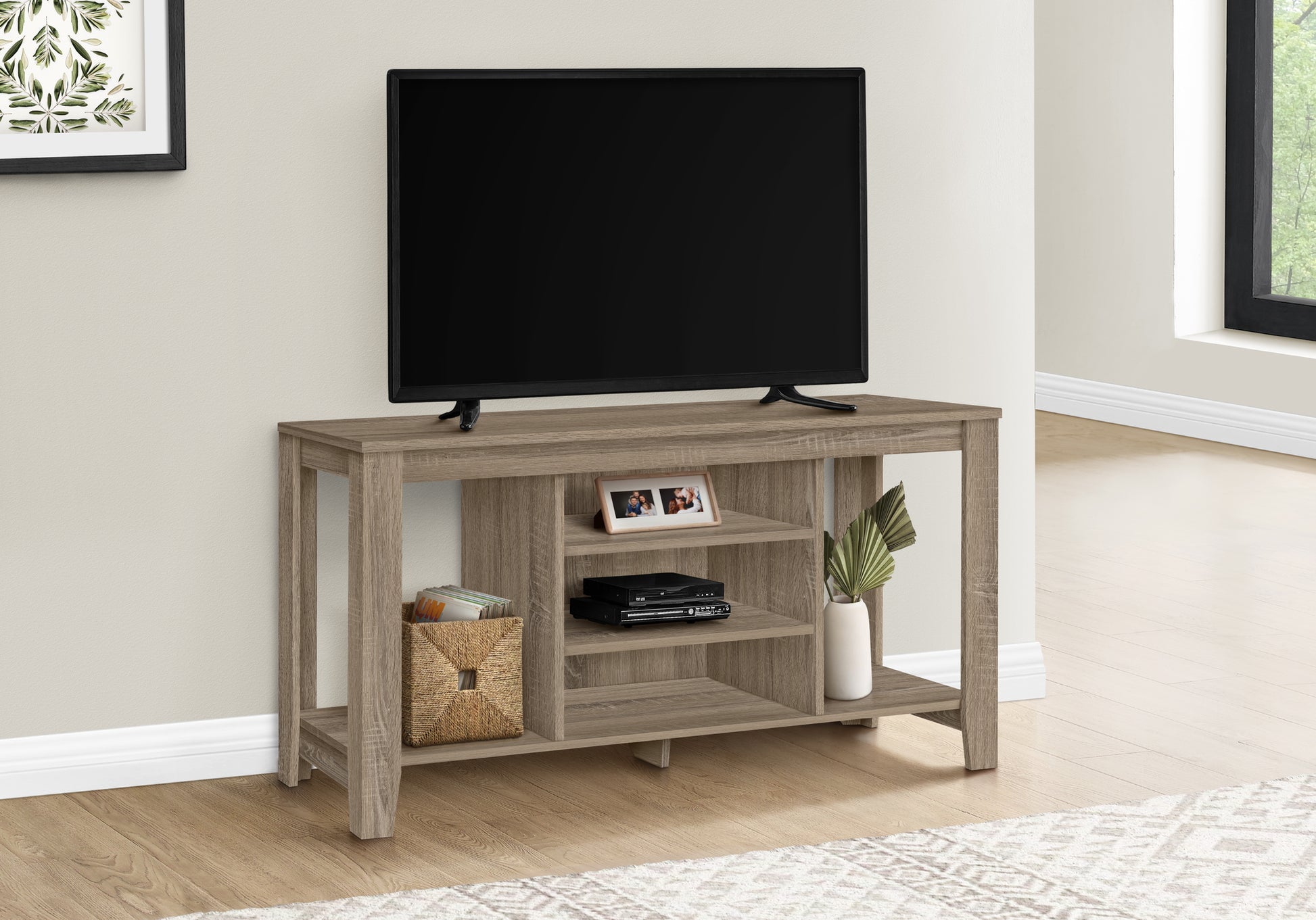 Modern grey wash TV stand with open shelving and a compact design