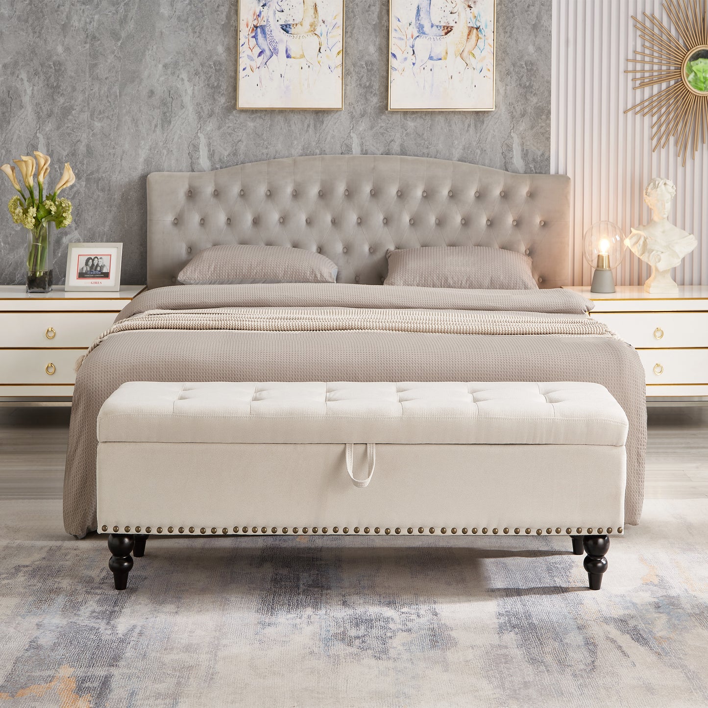 Beige tufted storage bench with nailhead trim and dark wooden legs