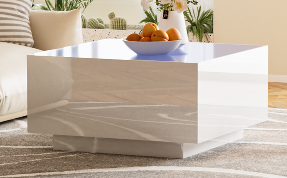 Glossy white modern coffee table with hidden storage