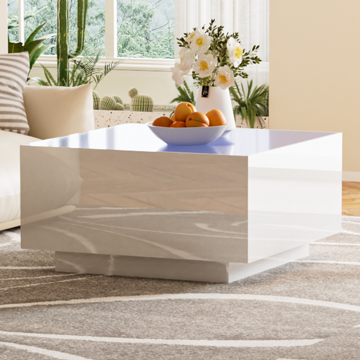 Modern highgloss white coffee table with a spacious top holding a fruit bowl