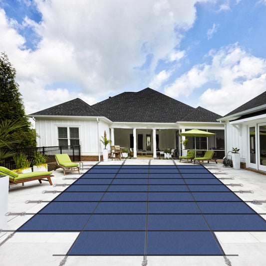 Dark blue solid pool cover with spring mechanisms for secure installation