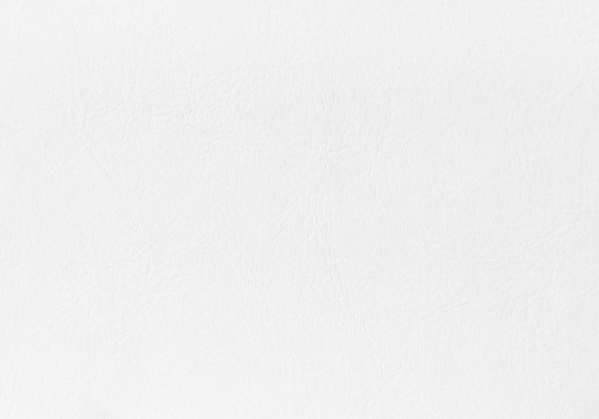 Closeup of white pebble grain faux leather texture for upholstery