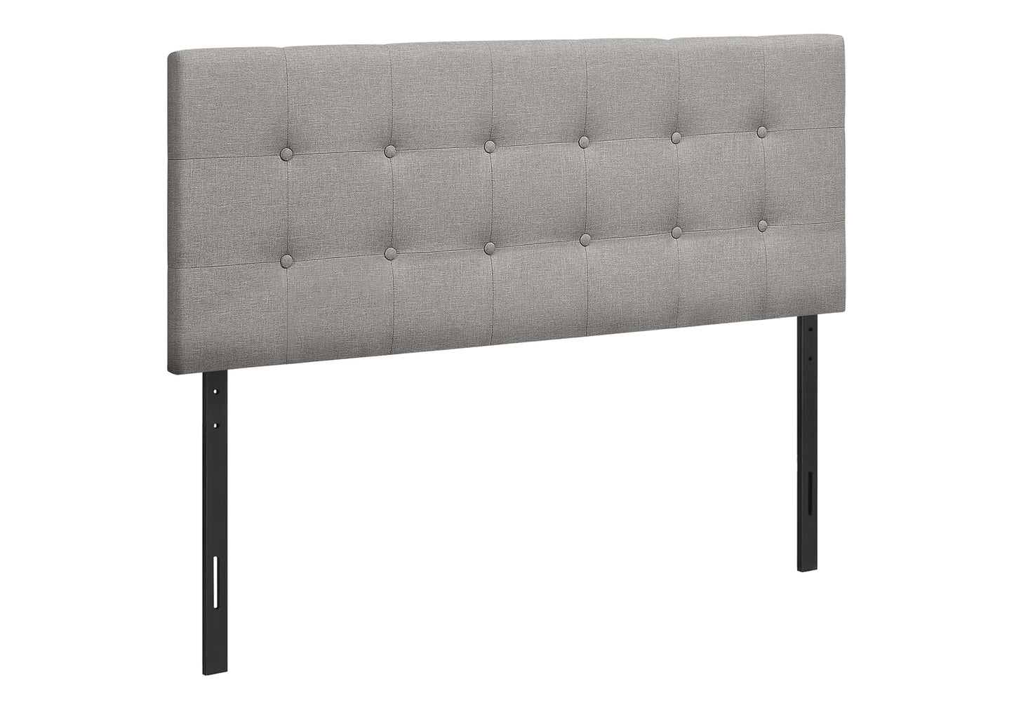 Gray fabric tufted headboard with black metal legs a modern bedroom accent