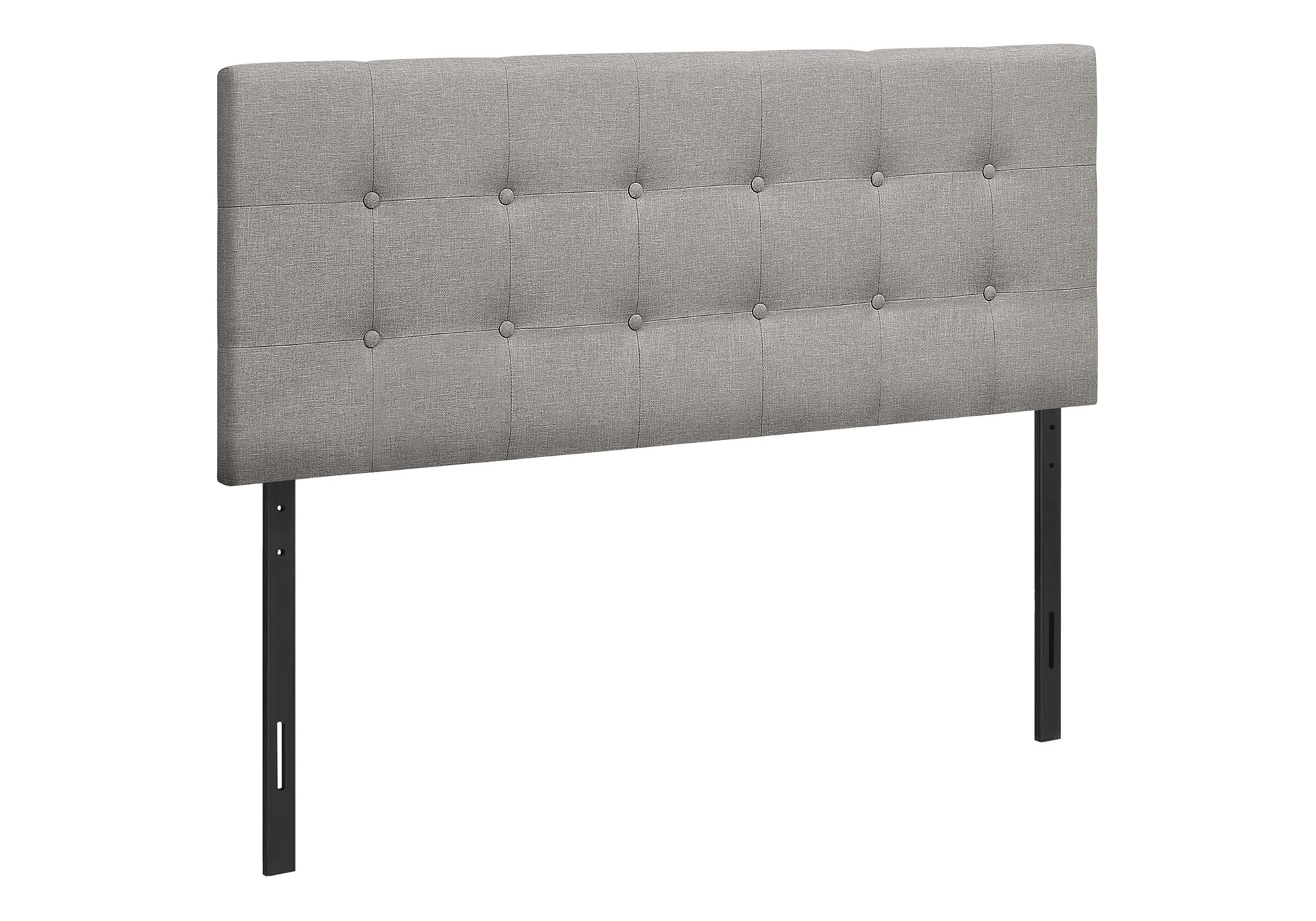 Gray fabric tufted headboard with black metal legs a modern bedroom accent