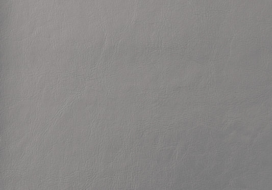 Closeup of textured grey vegan leather swatch with subtle grain for upholstery