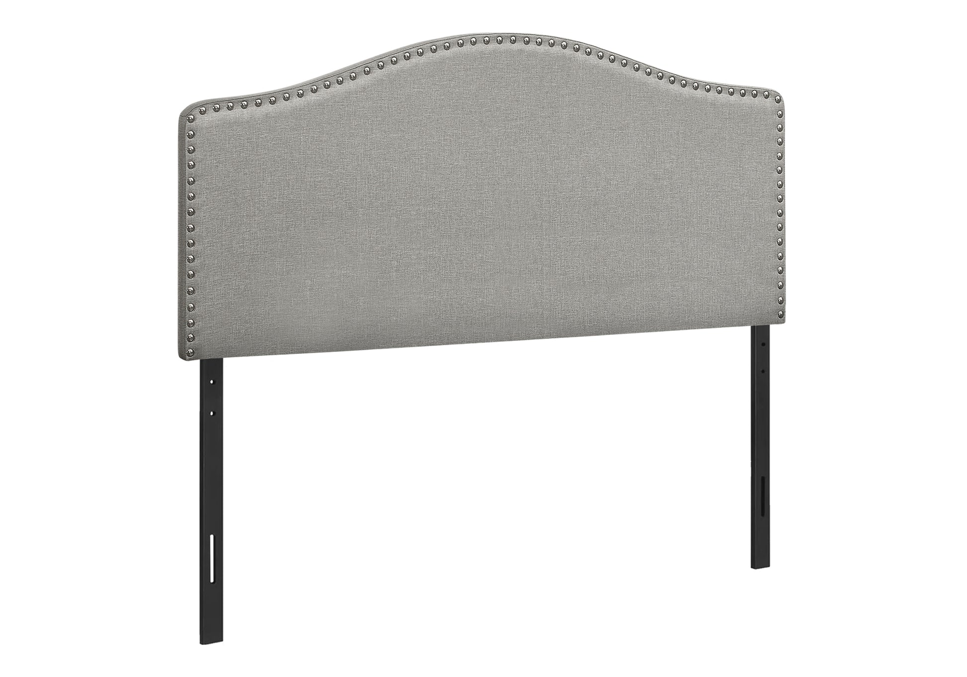 Gray upholstered headboard with nailhead trim and adjustable black metal legs