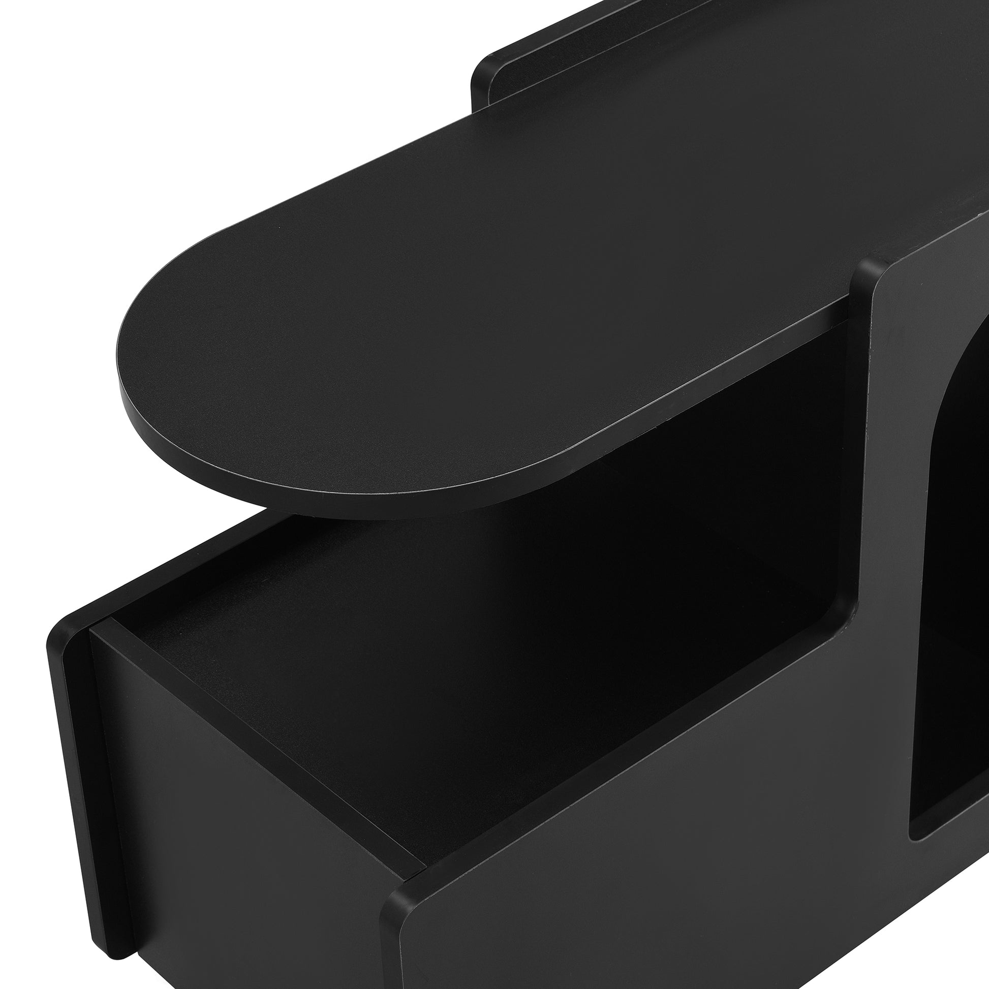 Black modern floating shelf with rounded edges for a minimalist living room setup