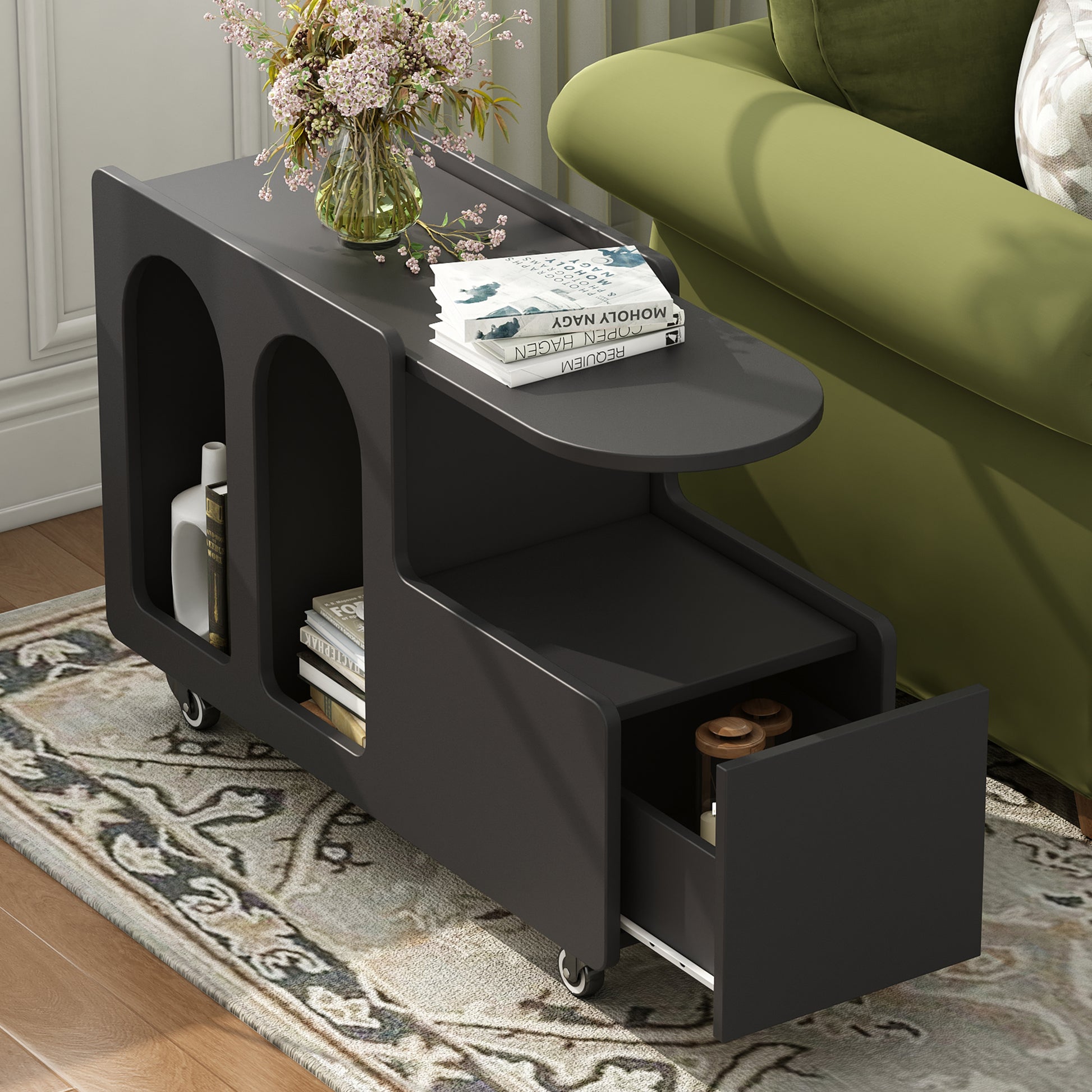 Sleek black bedside table with casters featuring arched compartments and a pullout drawer