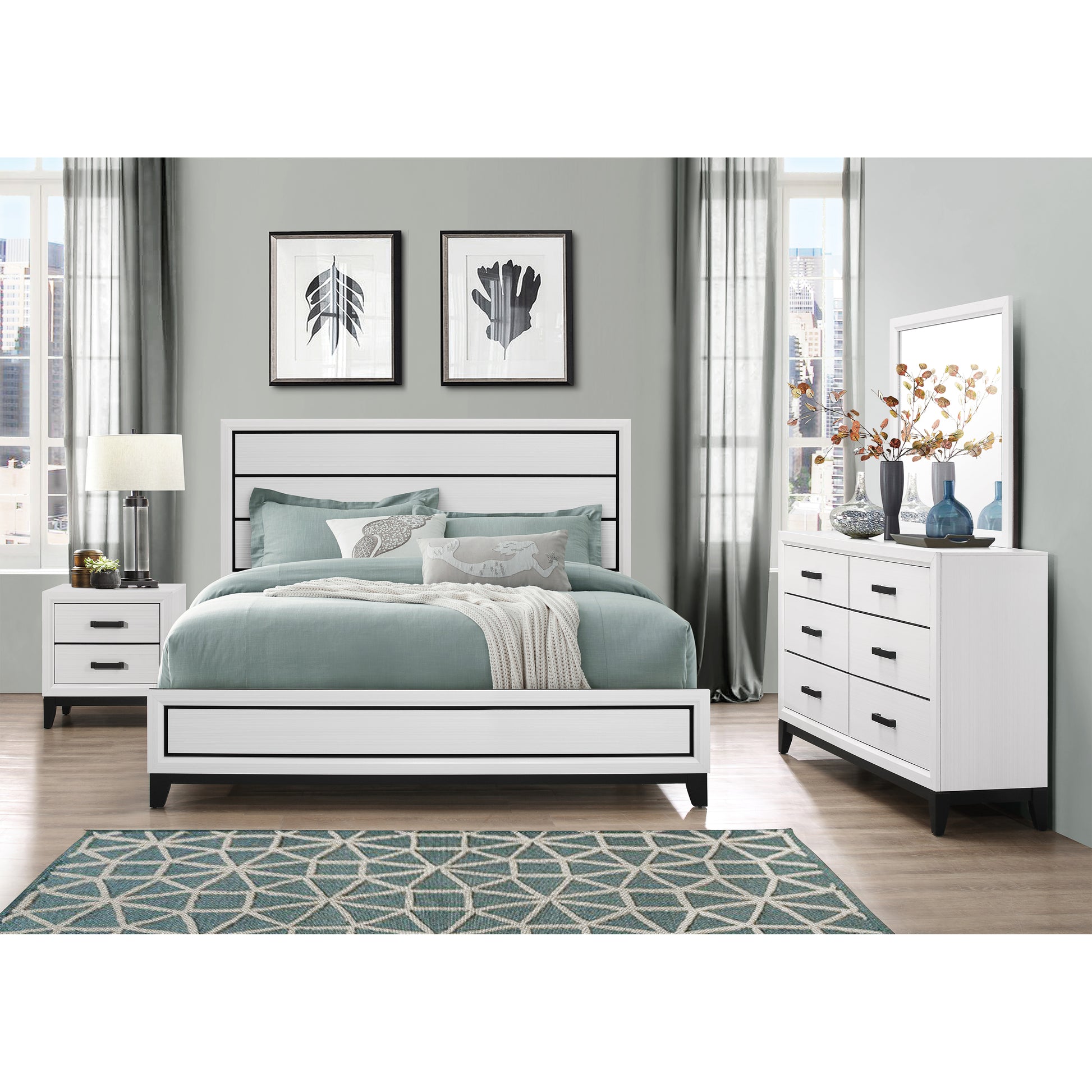 Modern white platform bed with black accents and teal bedding