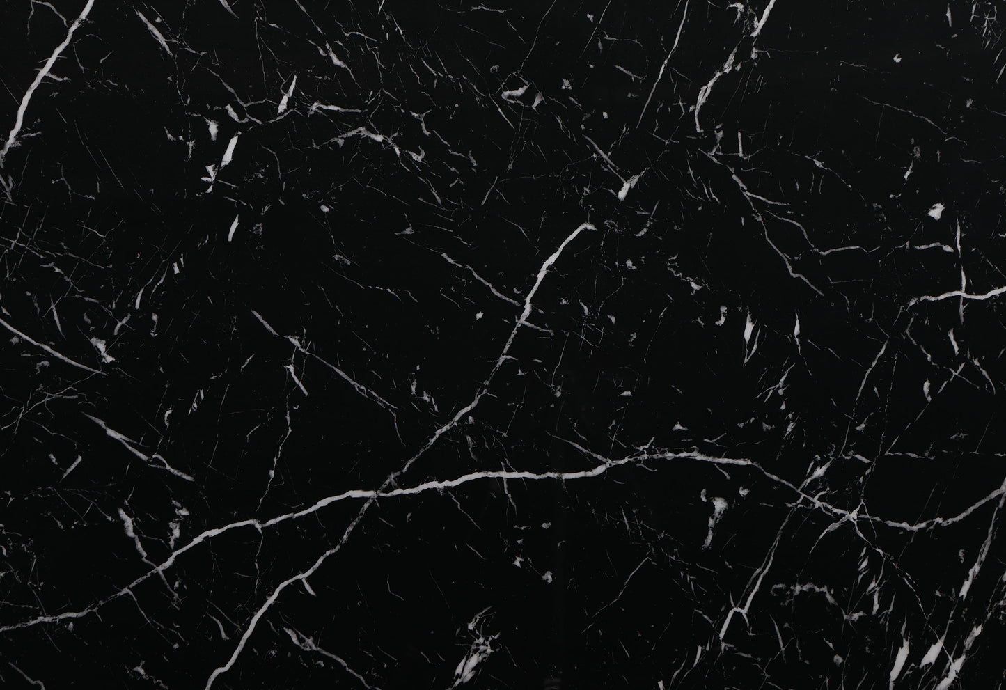 Seamless black marble texture with white veining ideal for countertops