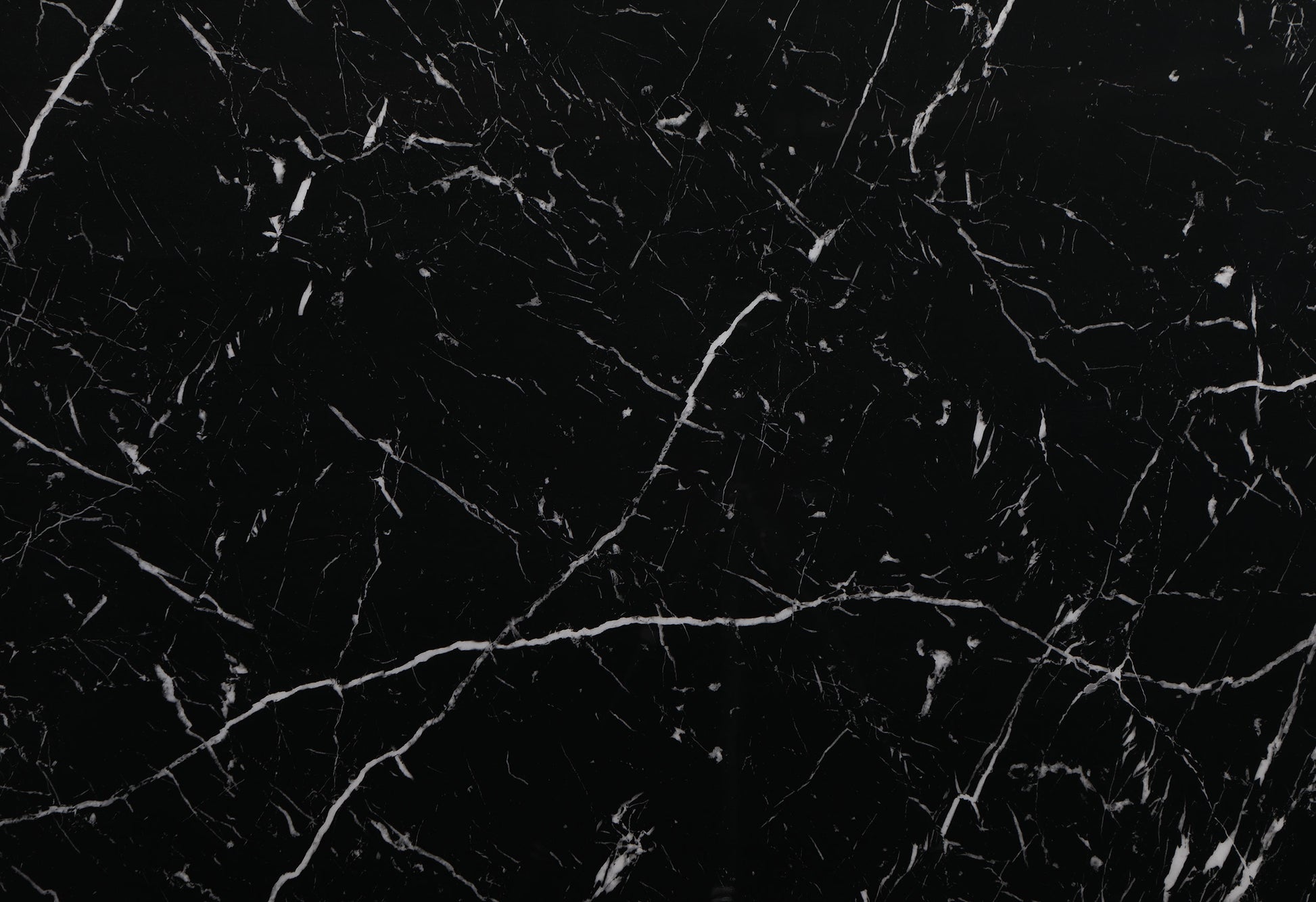 Seamless black marble texture with white veining ideal for countertops