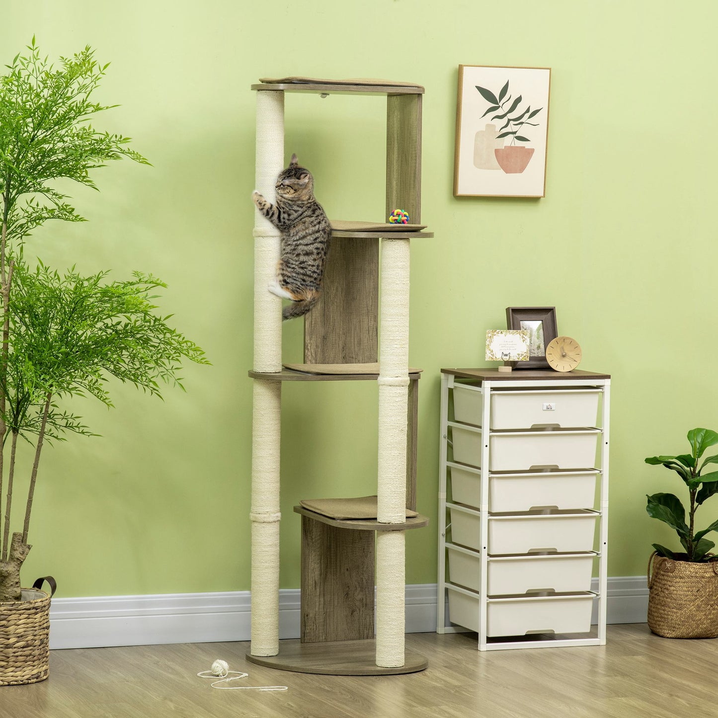 Multilevel cat tree with scratching posts and platforms featuring a tabby cat climbing