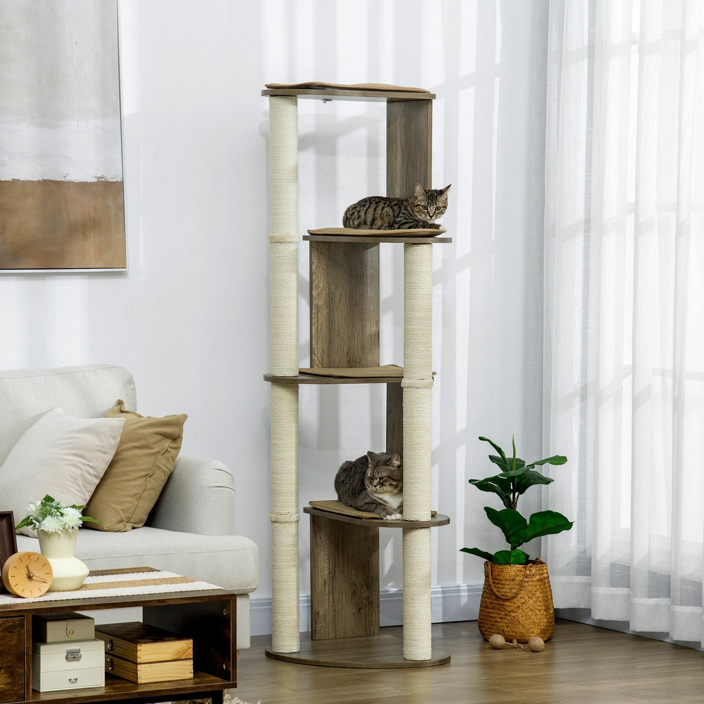 Multilevel cat tree with sisal scratching posts and a tabby cat lounging