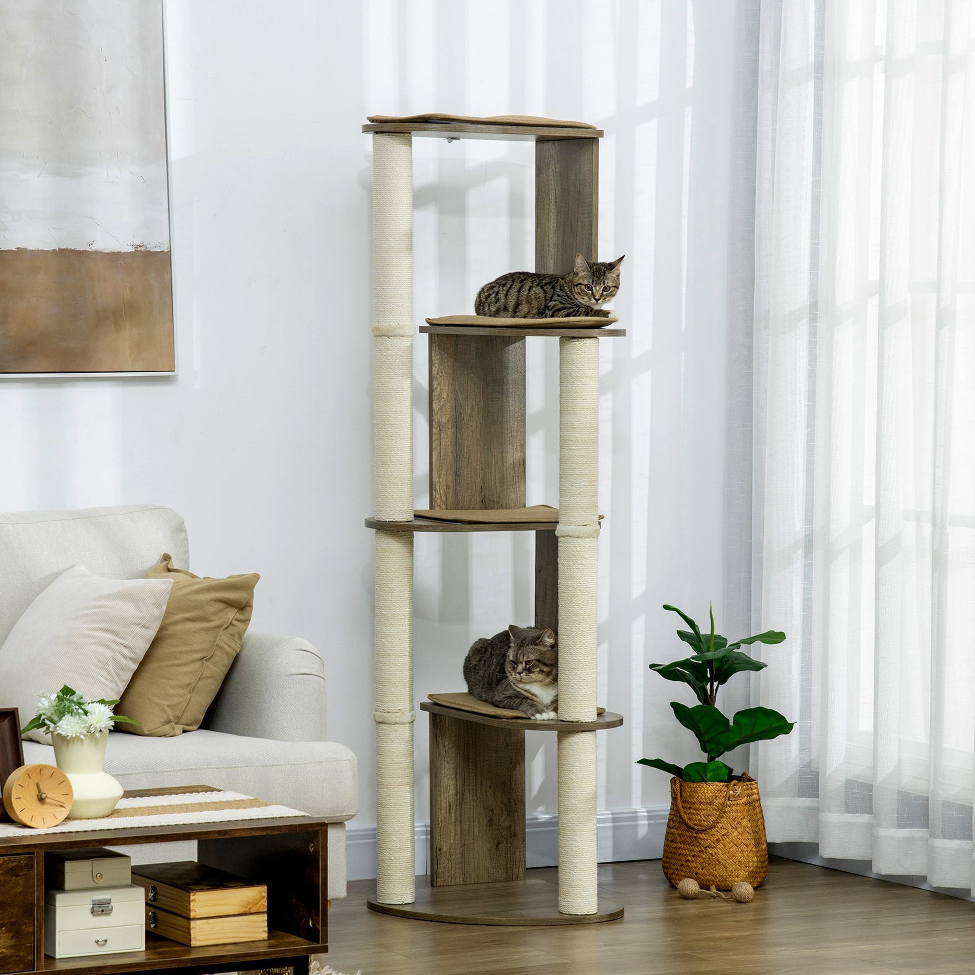 Multilevel cat tree with sisal scratching posts and a tabby cat lounging