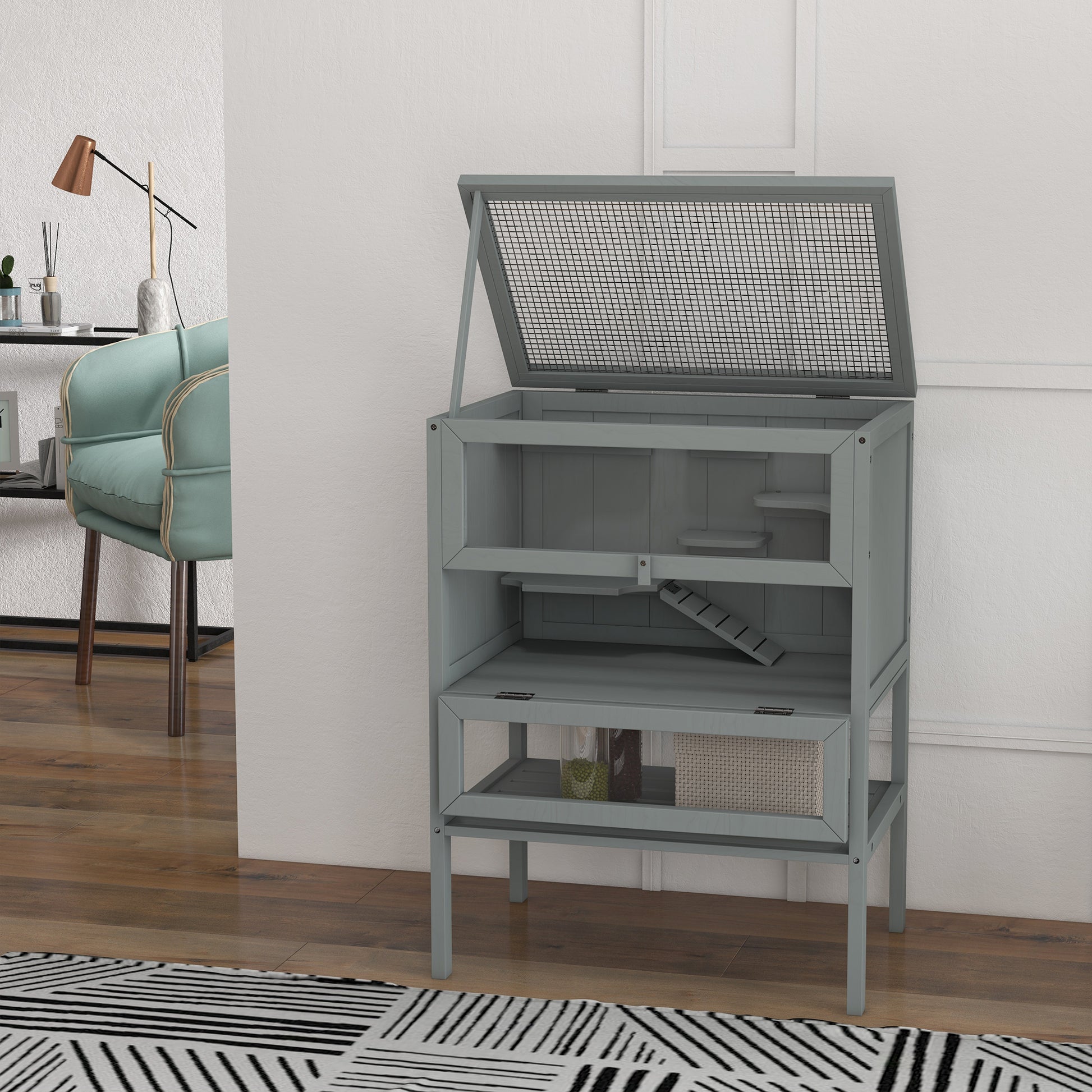 Gray wooden hamster cage with multiple levels and ramps