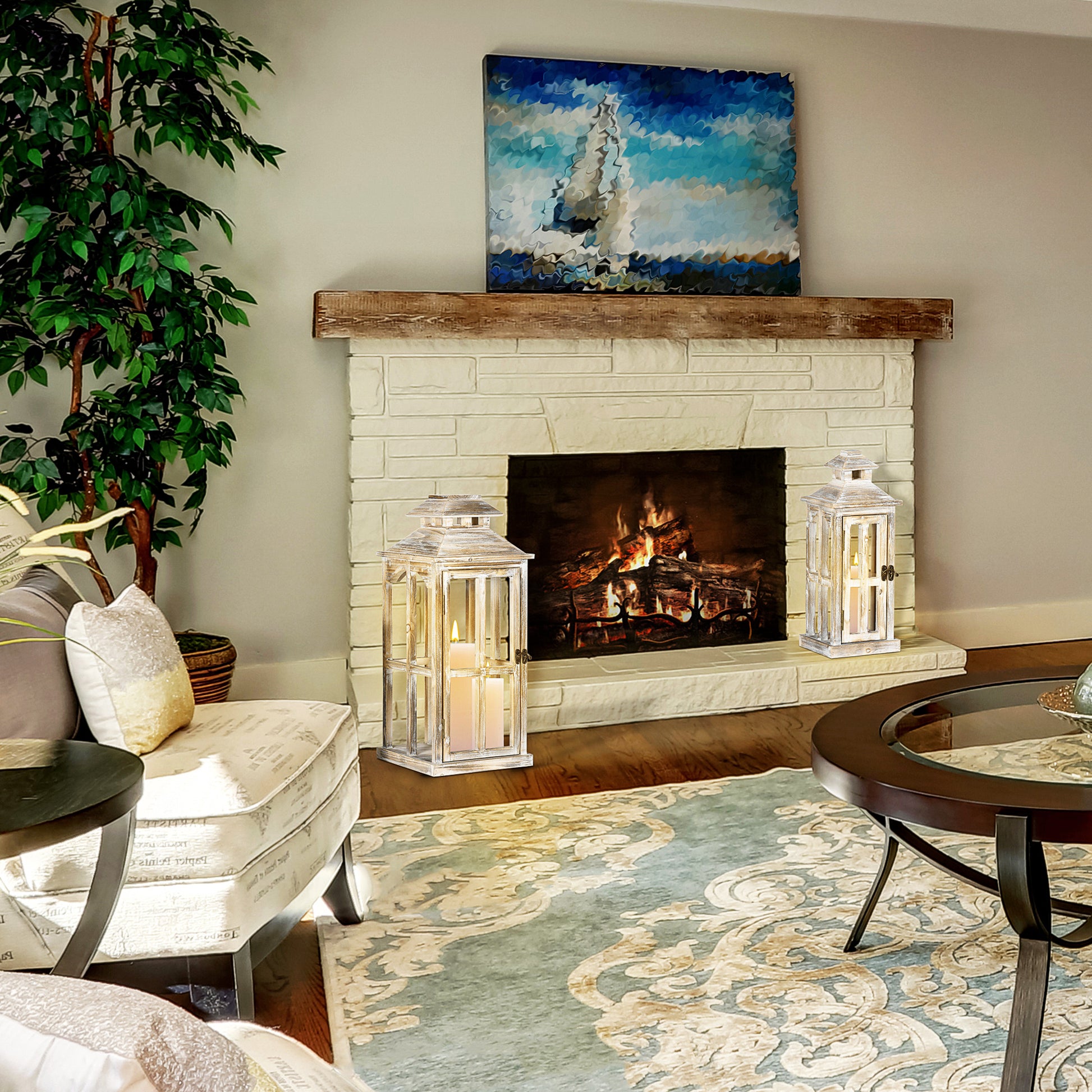 Distressed white wooden lantern with tall pillar candles inside providing ambient lighting