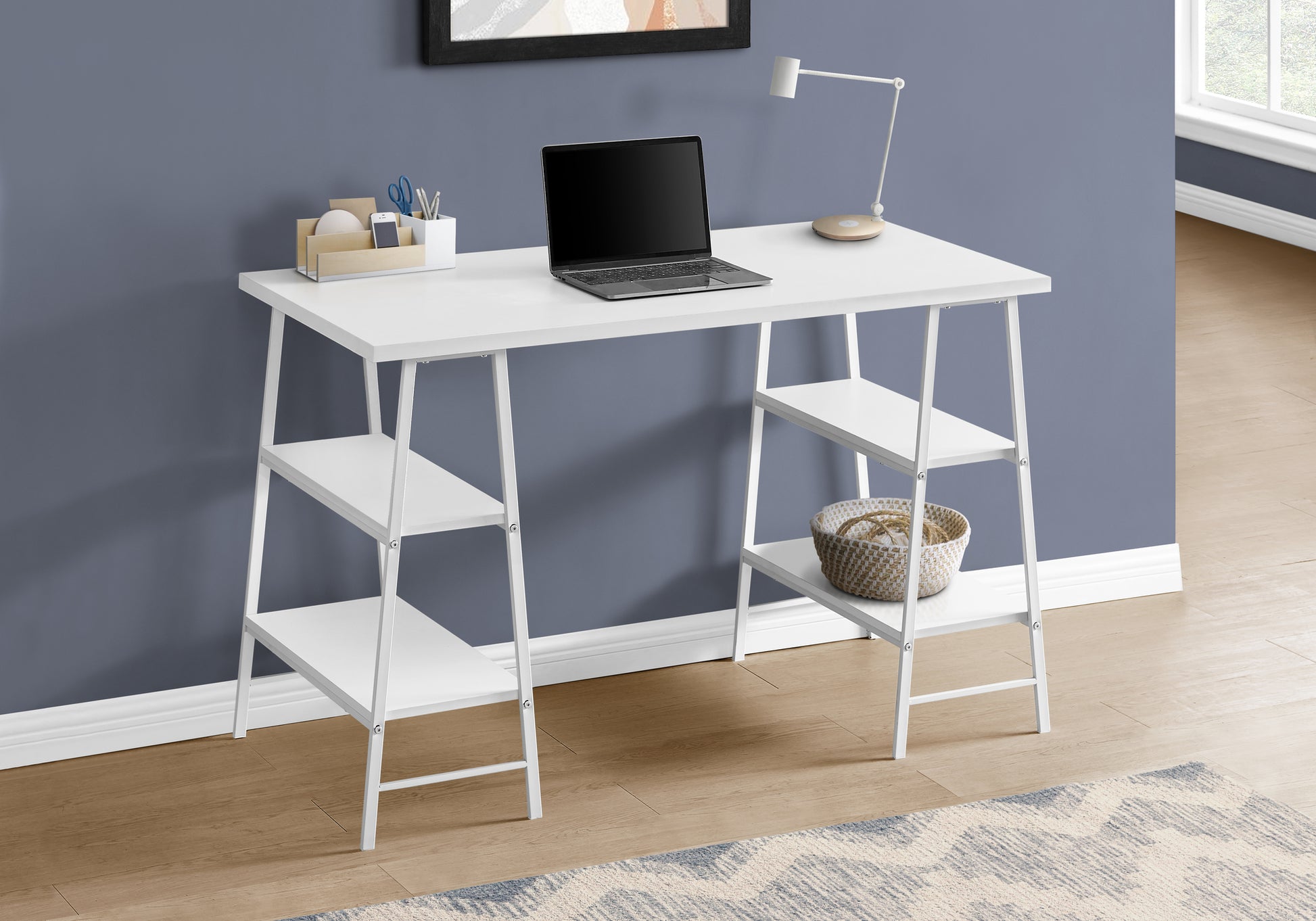 Modern white minimalist computer desk with integrated shelves and laptop