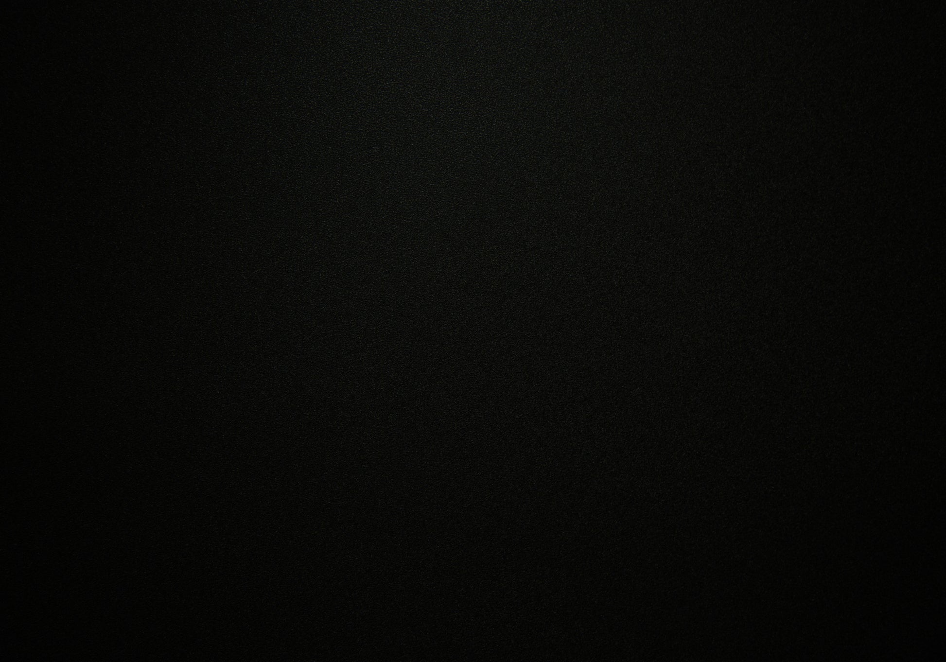 Abstract black textured background suitable for product backdrops