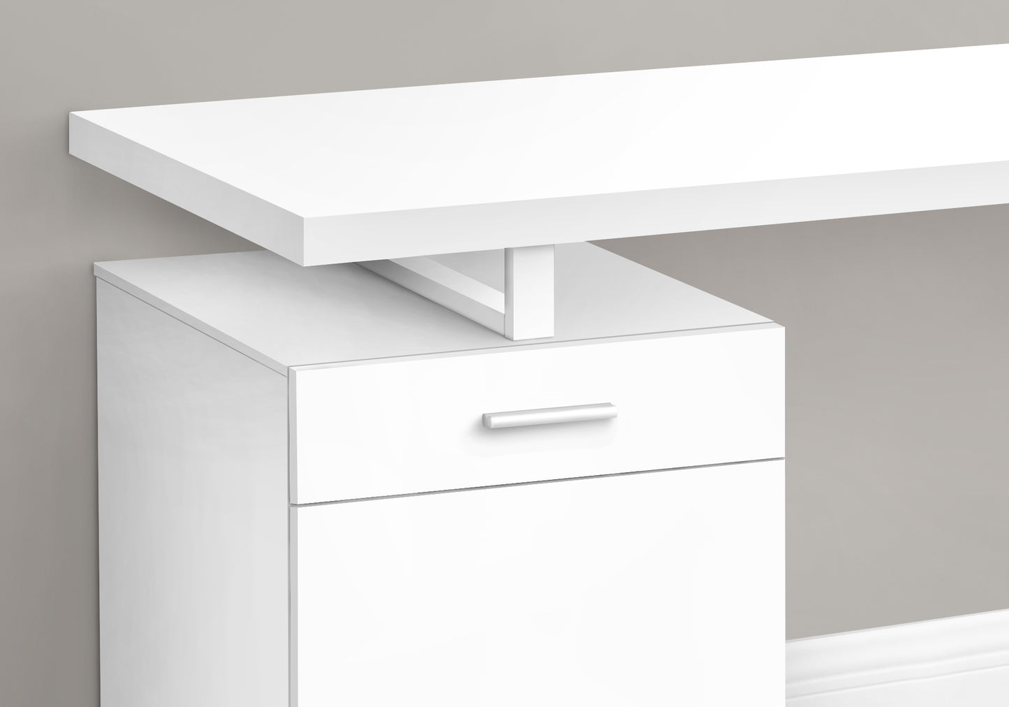 Modern white desk with a sleek floating tabletop and a single drawer cabinet