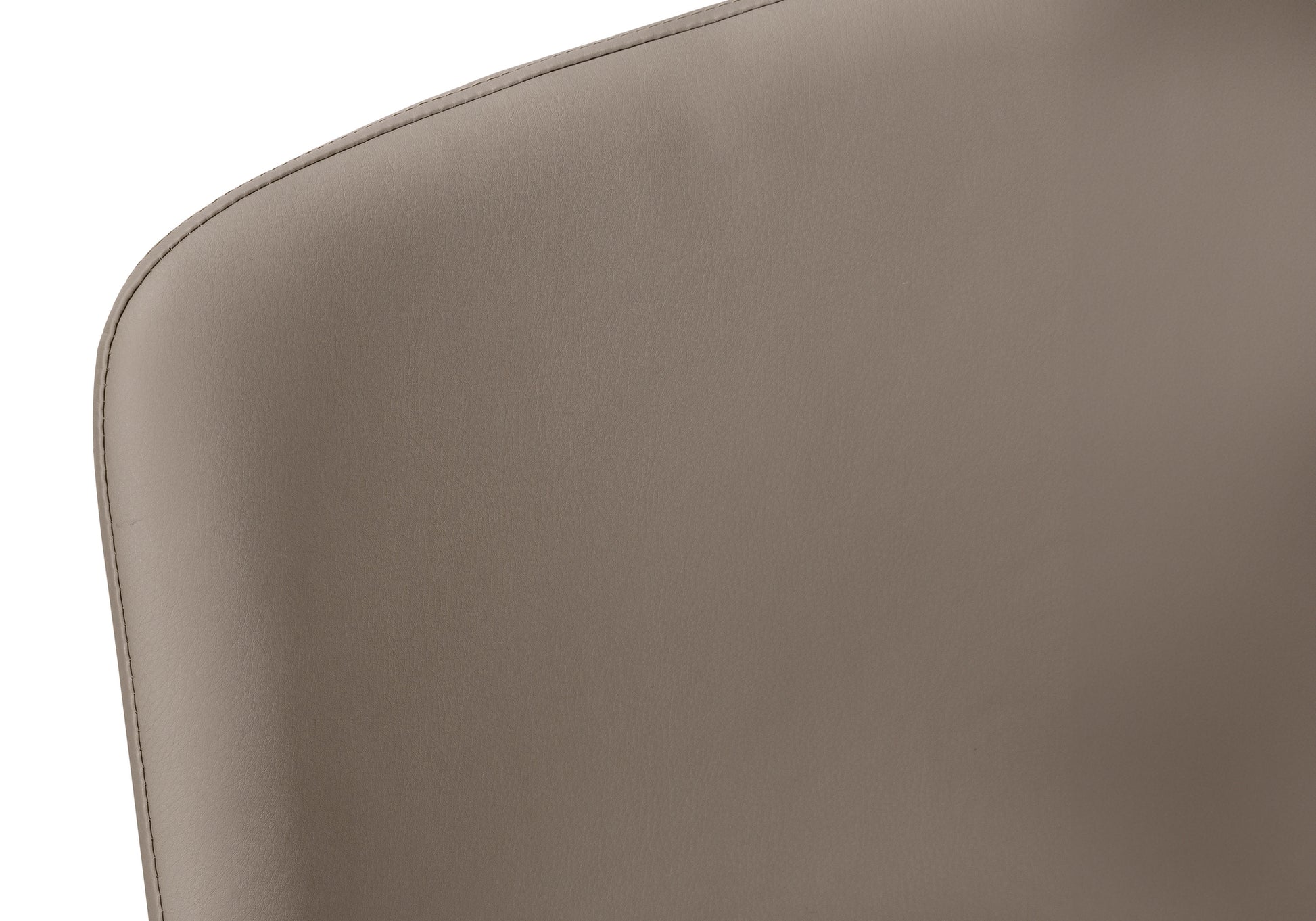 Taupe faux leather upholstery with detailed stitching on a chair back