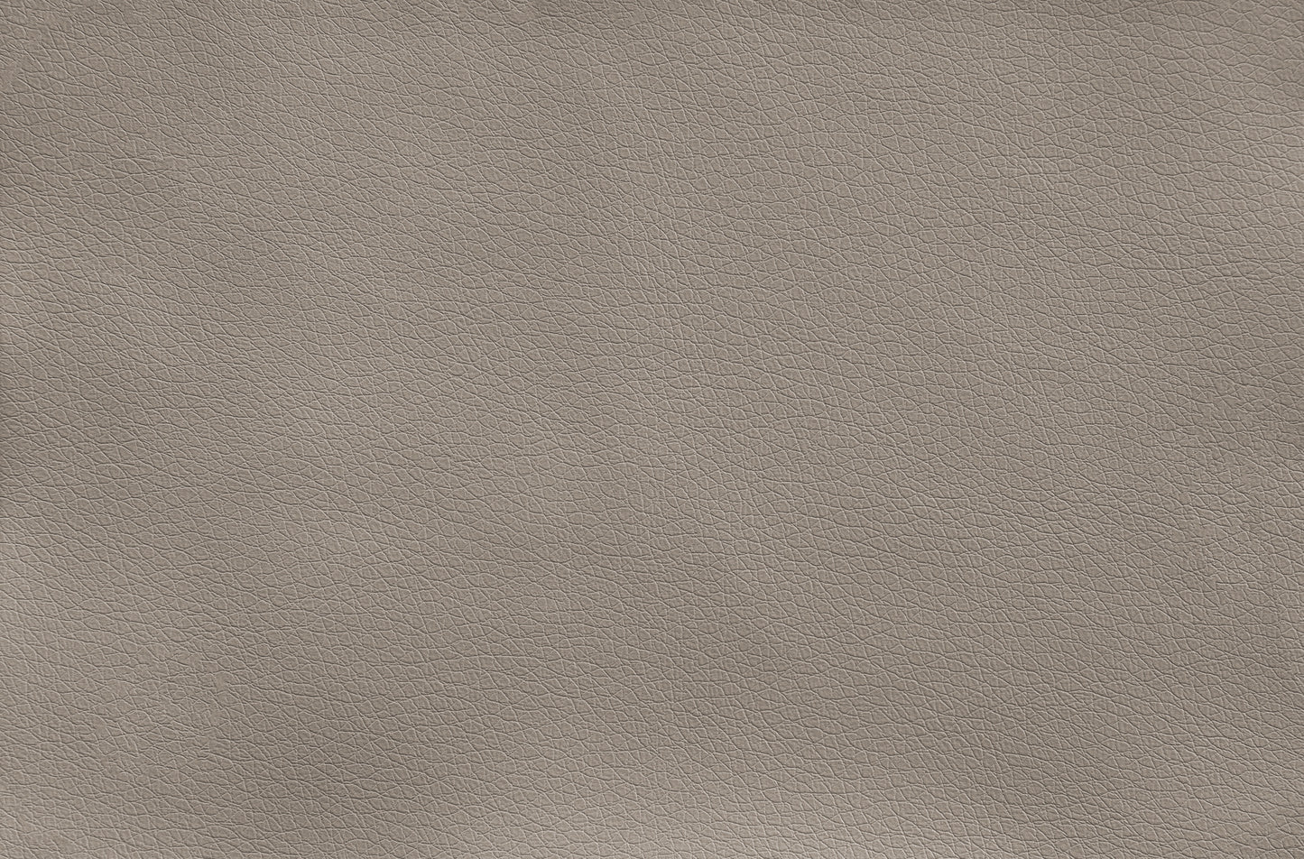 Closeup texture of taupe vegan leather upholstery for furniture