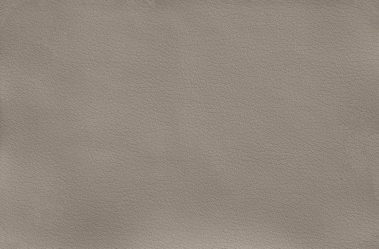 Closeup texture of taupe vegan leather upholstery for furniture