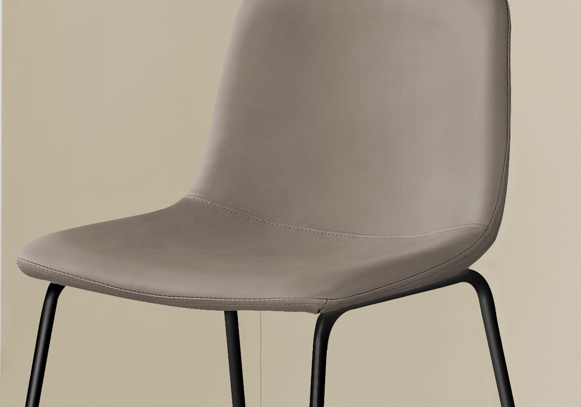 Taupe leather dining chair with black metal legs sleek modern design