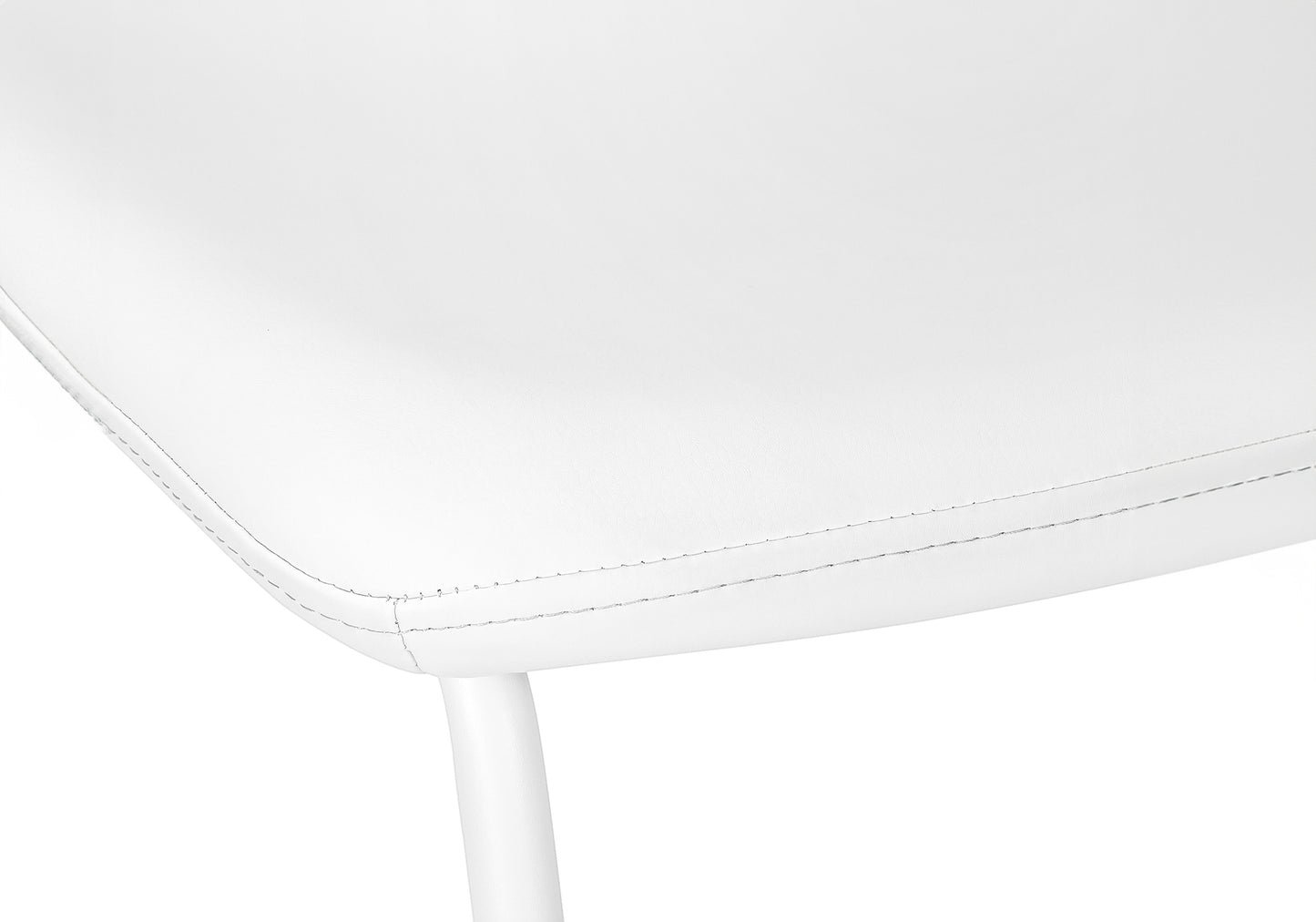 White faux leather chair seat detail with visible stitching and a white metal leg