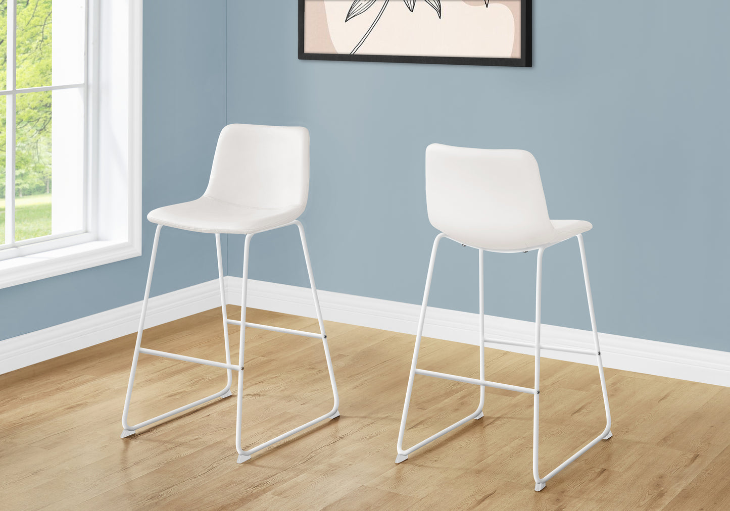 Two white modern bar stools with slender white metal legs