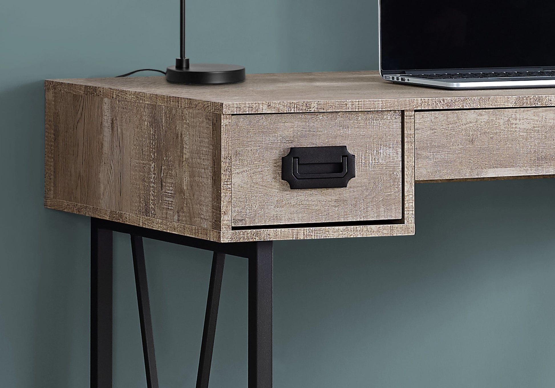 Rustic wood desk with black metal legs featuring a single drawer with industrial pull