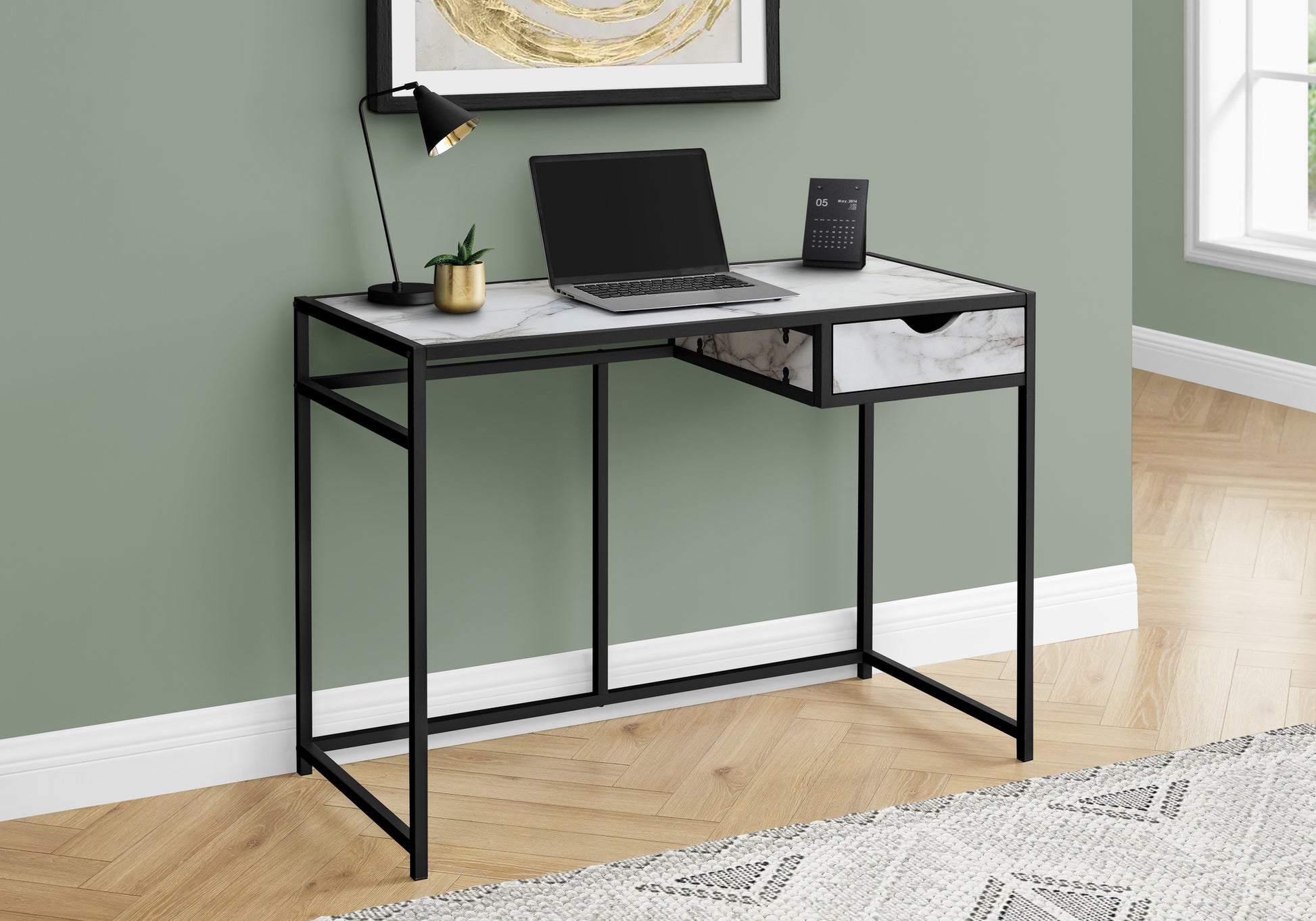 Modern console desk with white marble top and black metal frame perfect for home office