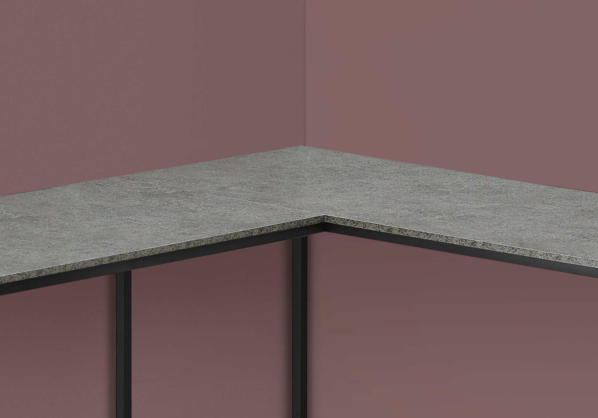 Modern grey speckled countertop with a matte black metal frame perfect for a minimalist kitchen