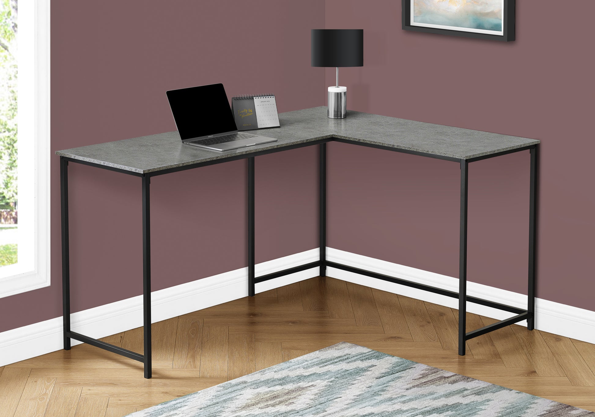 Grey Lshaped desk with black metal legs ideal for home offices