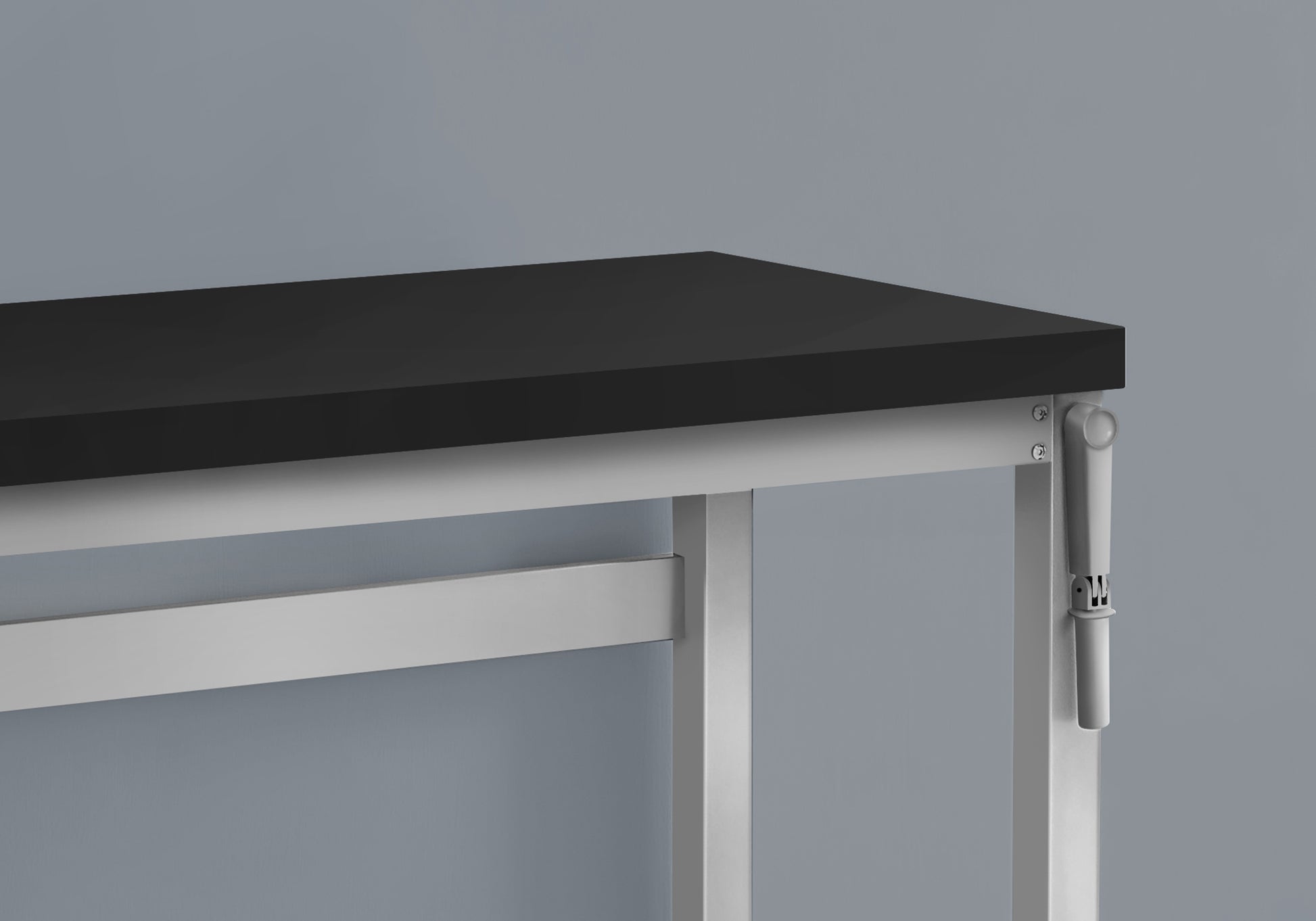 Modern black rectangular desk with silver metal frame and adjustable height mechanism