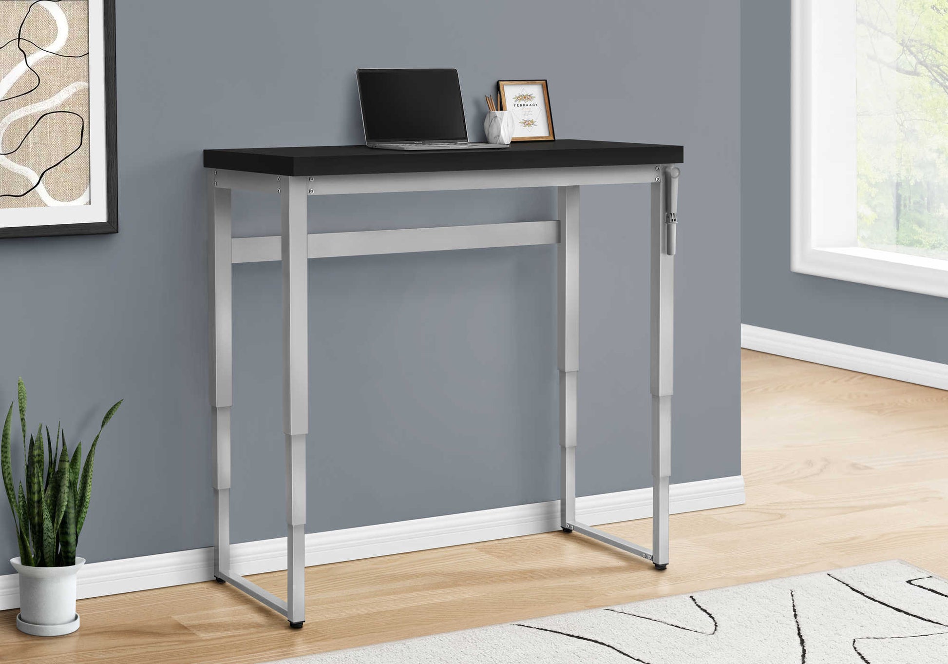 Modern black and silver standing desk with adjustable height