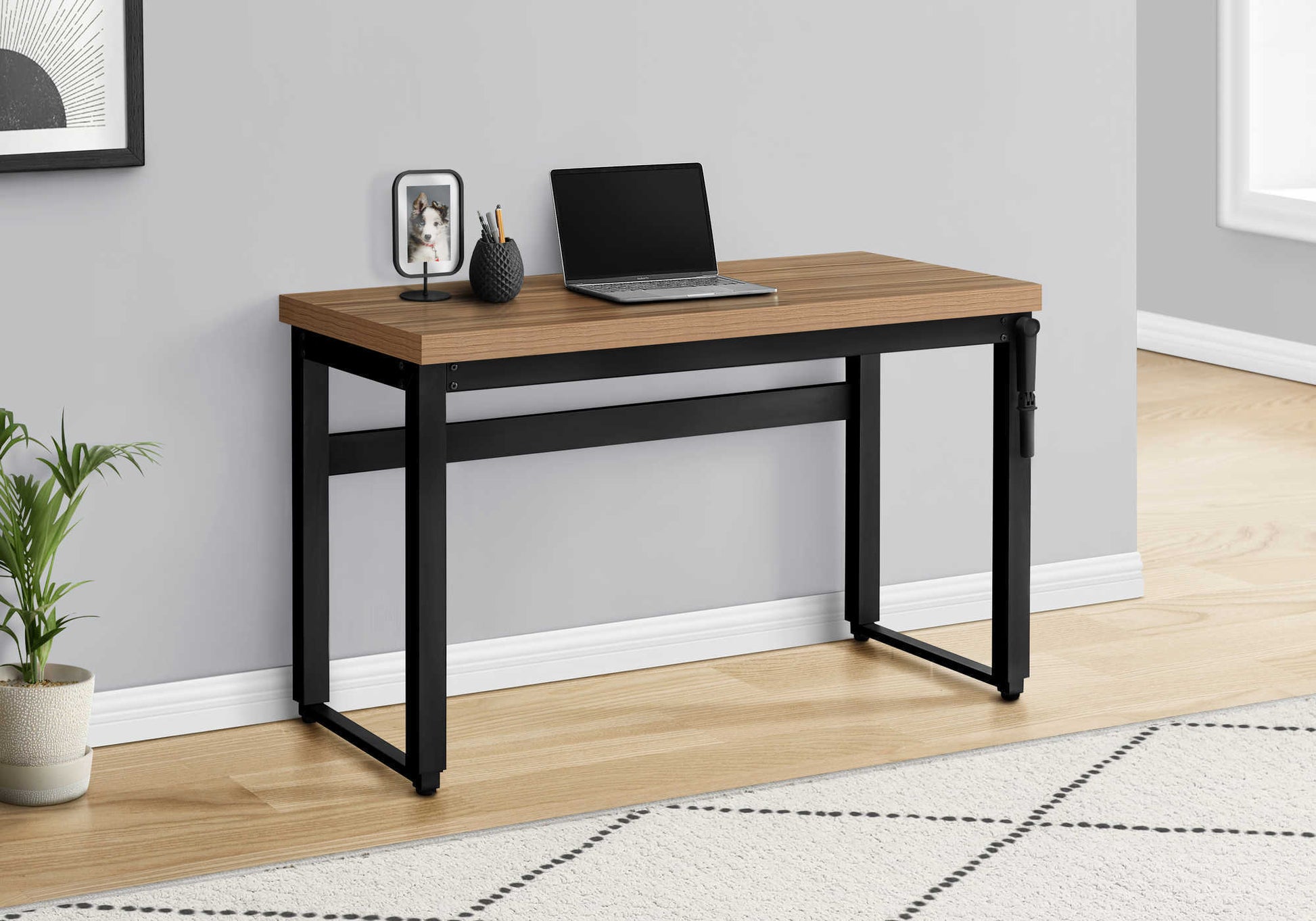 Compact wood desk with black metal frame perfect for small home offices
