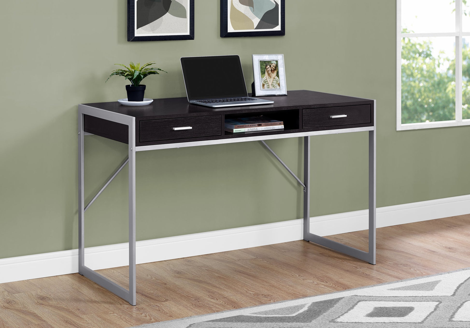 Dark wood writing desk with silver metal frame featuring two drawers and an open shelf for home office use