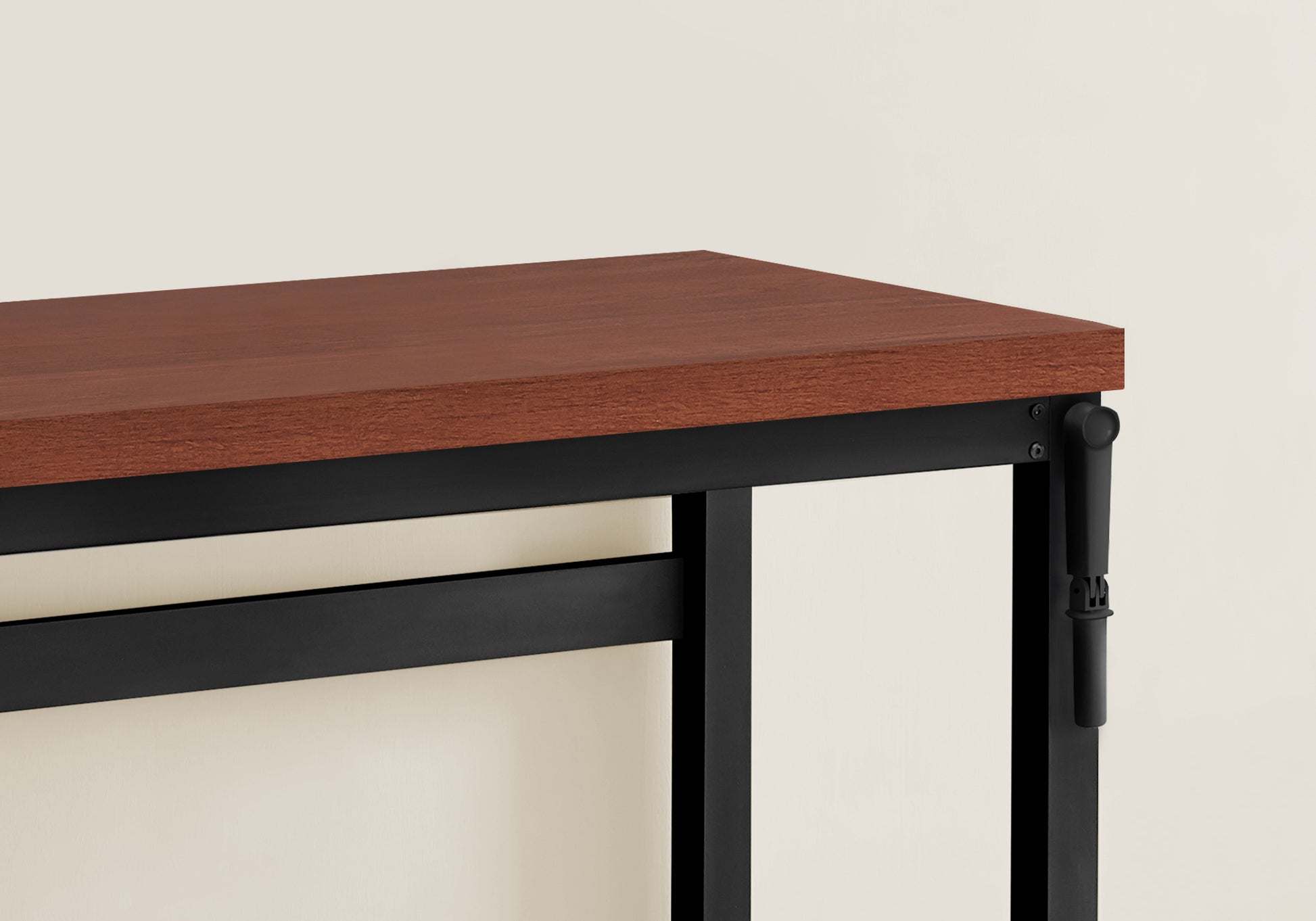 Cherry wood desk with black metal frame and adjustable leg