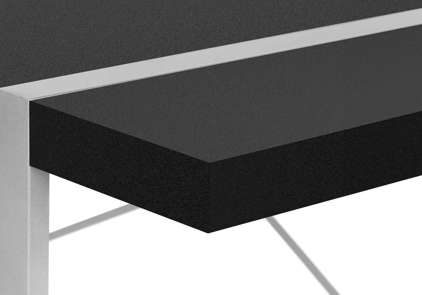 Black textured desk surface with silver metal trim and leg detail
