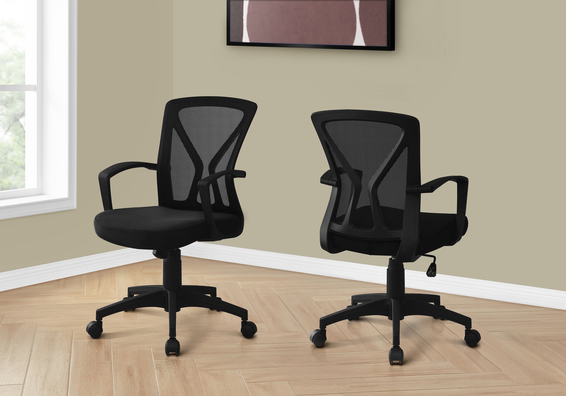 Black mesh ergonomic office chair with adjustable height and armrests for comfortable work