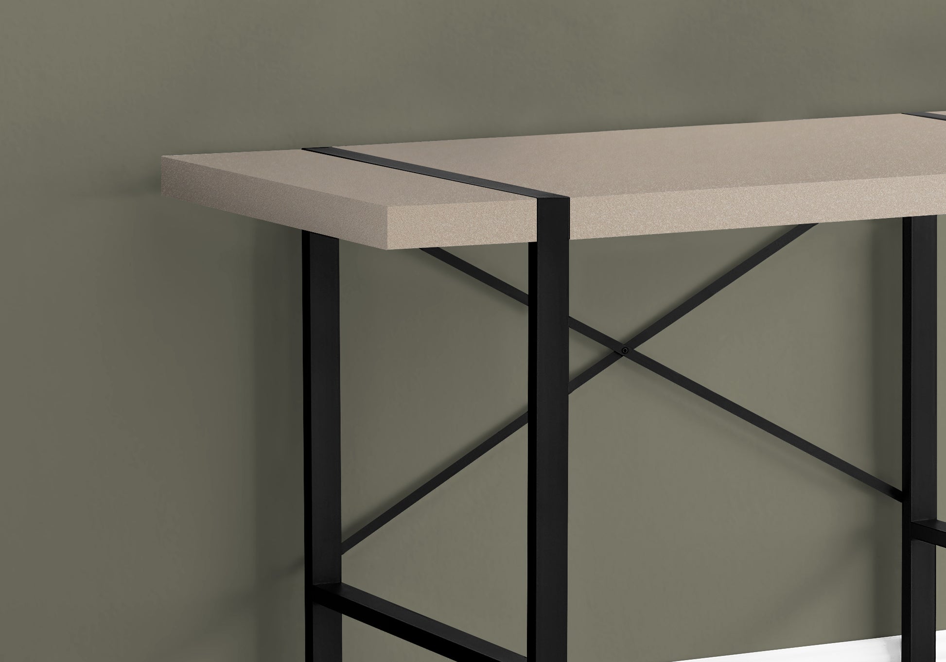 Modern console table with a speckled taupe top and black metal frame